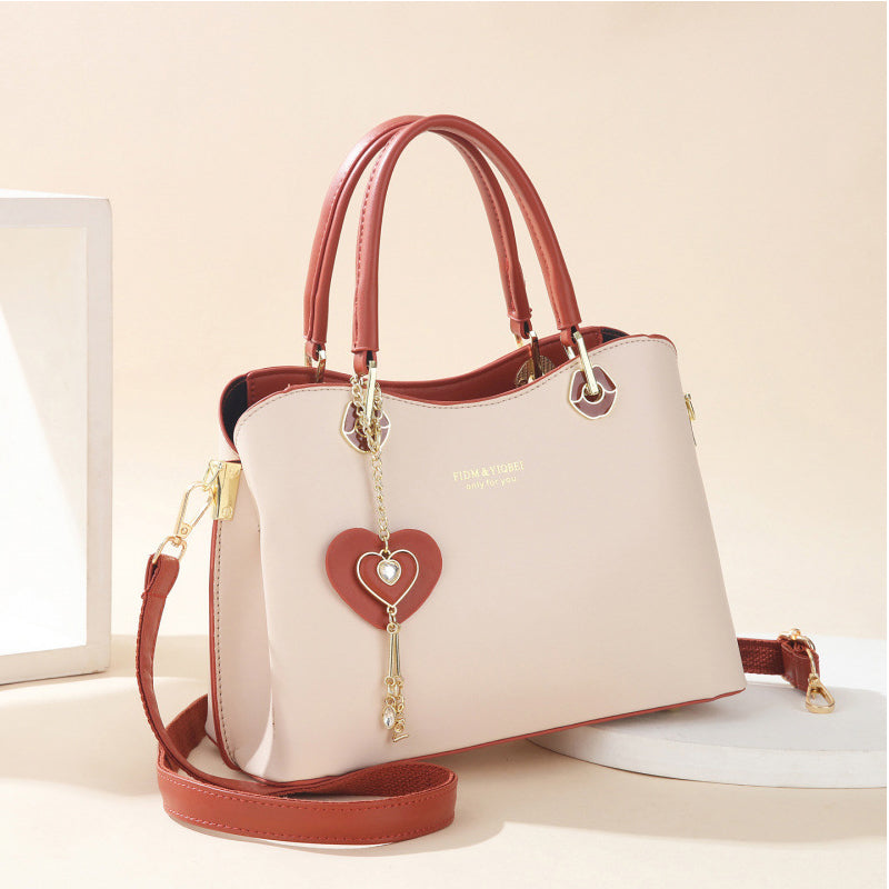 Elegante Damestas met Hartvormige Hanger