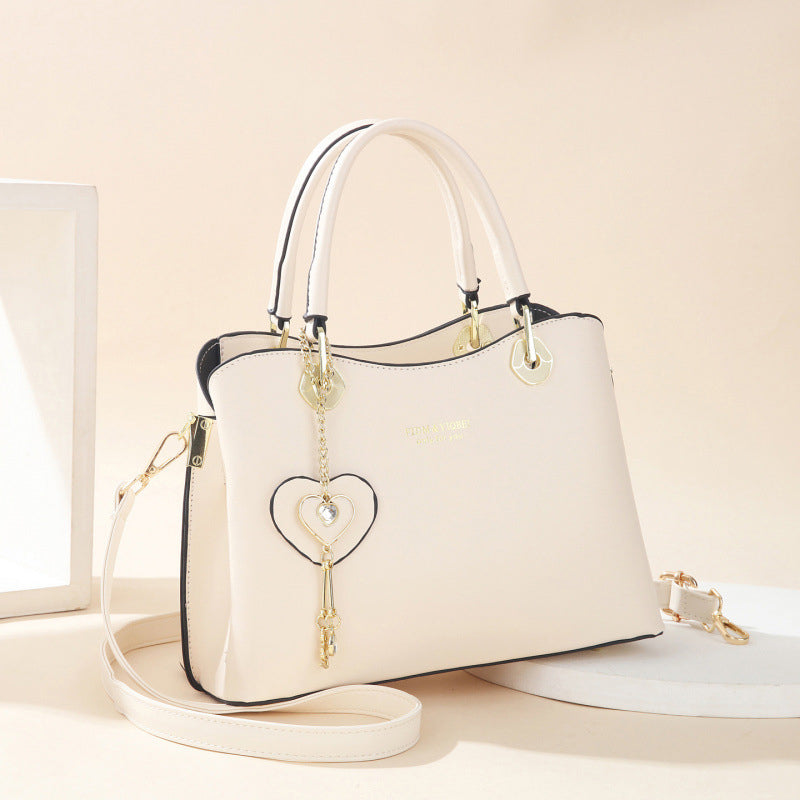 Elegante Damestas met Hartvormige Hanger